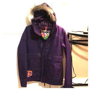 Women’s small purple snowboarding coat.